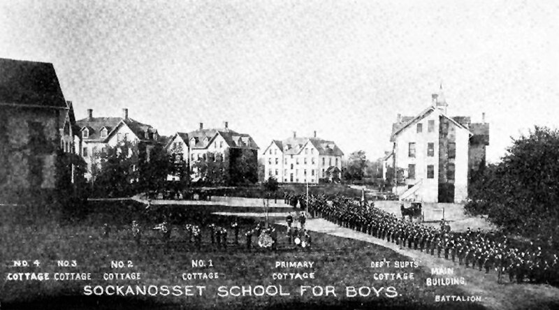 Vintage postcard of the school and its cottages.